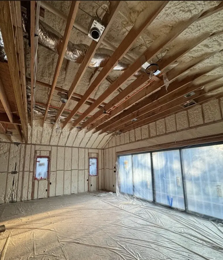 Interior walls and ceiling insulated with spray foam during new construction in Clarcona